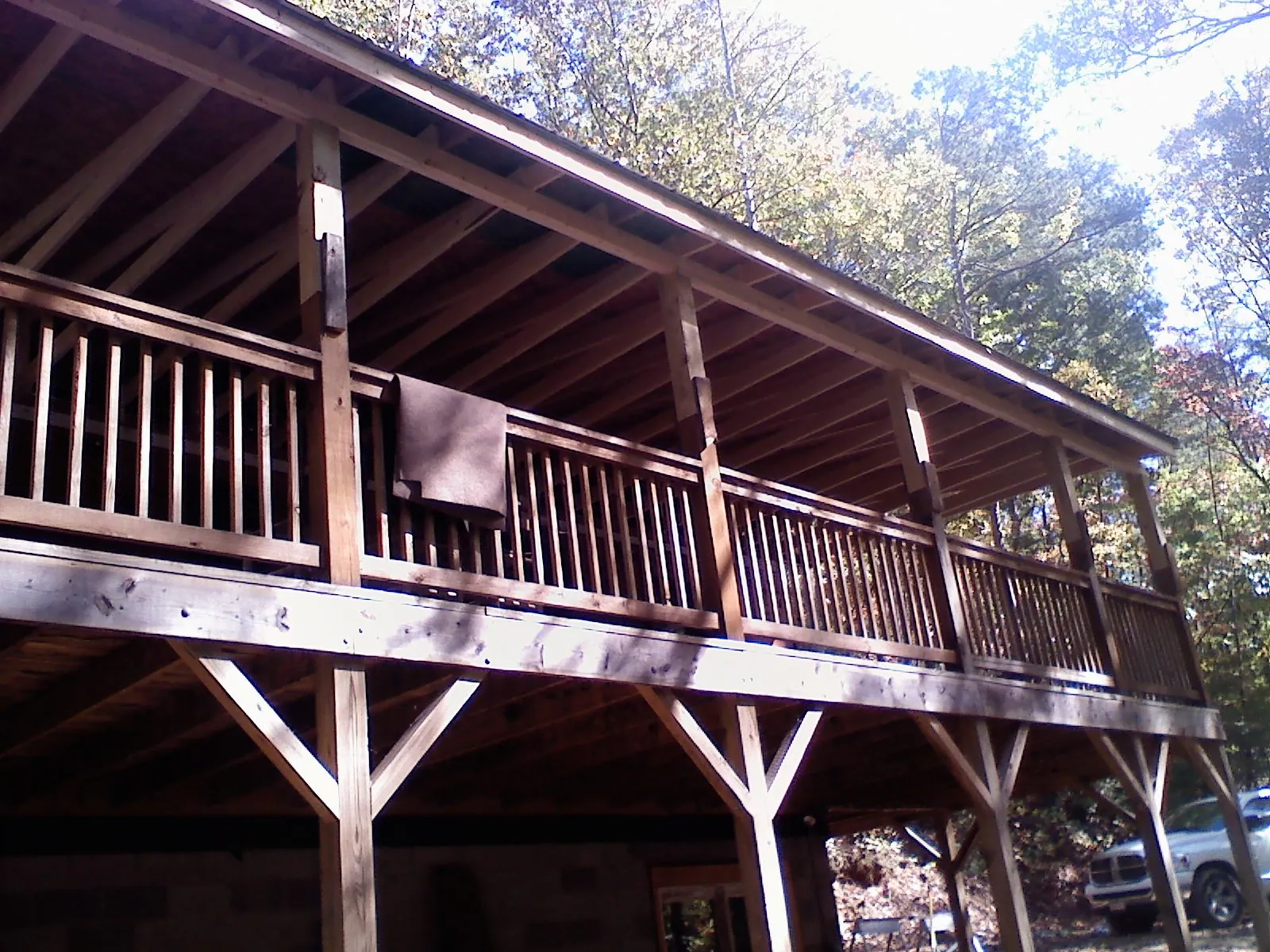 Timber framing under a new elevated porch and deck — Roof Leak Repair in Washington Navy Yard by Roofing Brothers
